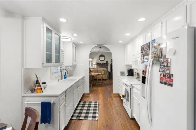 a view of a patio with table and chairs and wooden floor