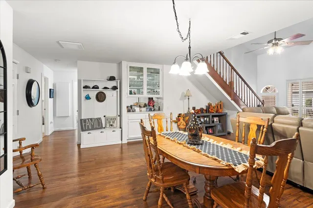 a work room with furniture and stairs