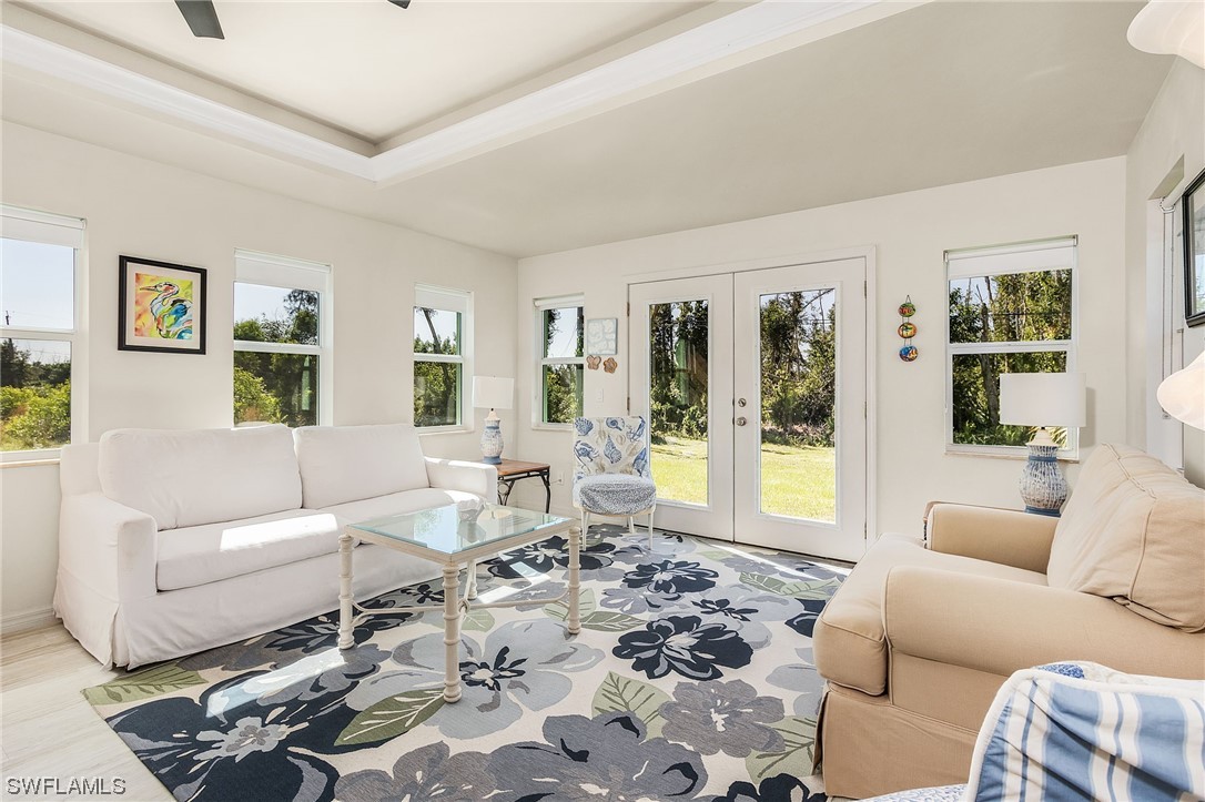5791 Mackerel Road Bokeelia, FL 33922 - Photo 15 of 24 a living room with furniture and a large window