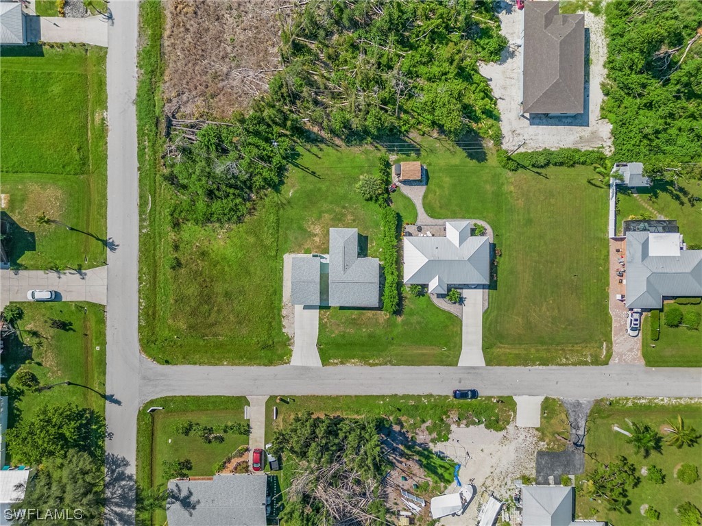 5791 Mackerel Road Bokeelia, FL 33922 - Photo 23 of 24 an aerial view of a house with a garden