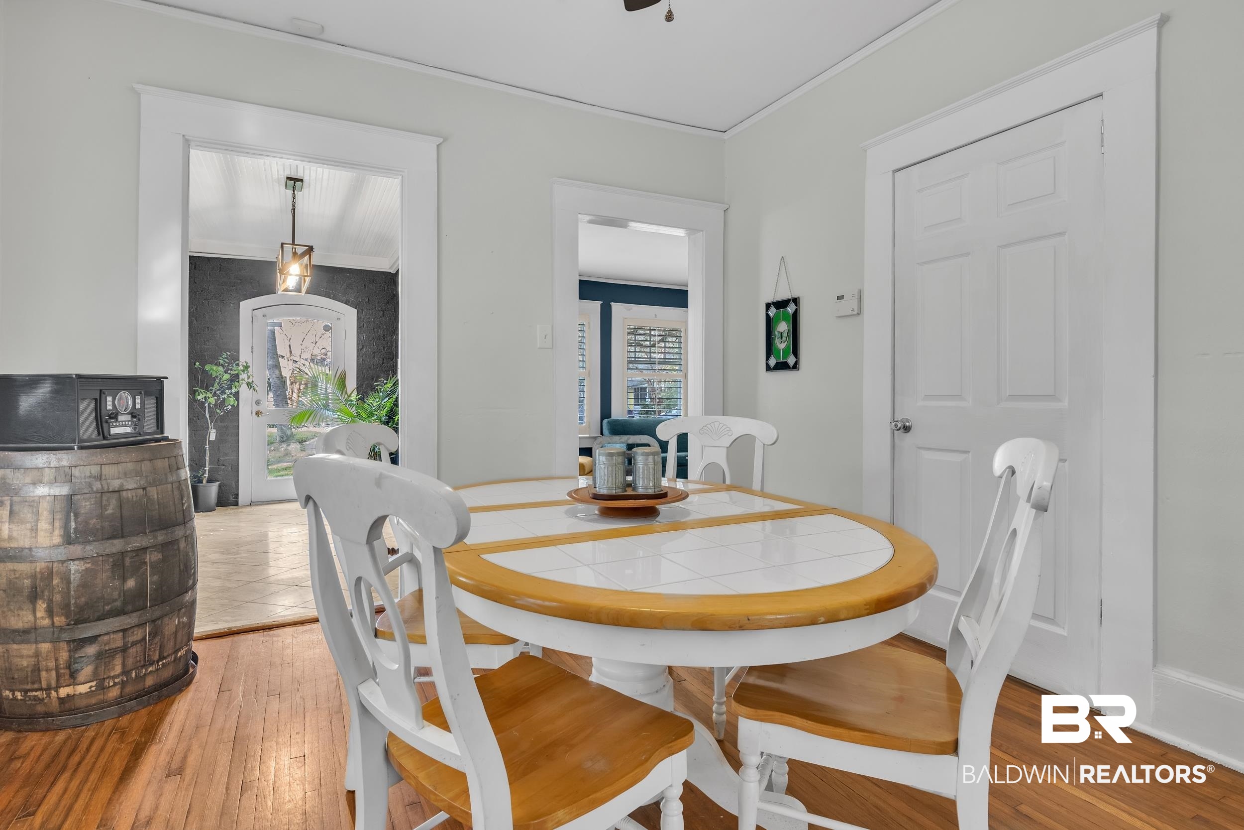 55 Mohawk Street Mobile, AL 36606 - Photo 22 of 28 Dining area featuring crown molding and light wood finished floors