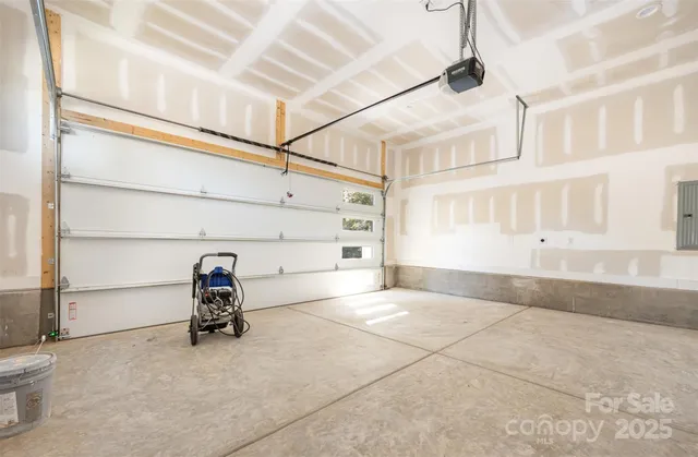 a view of a livingroom with storage and utility room