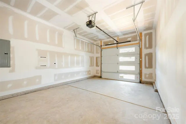 a view of an empty room with windows