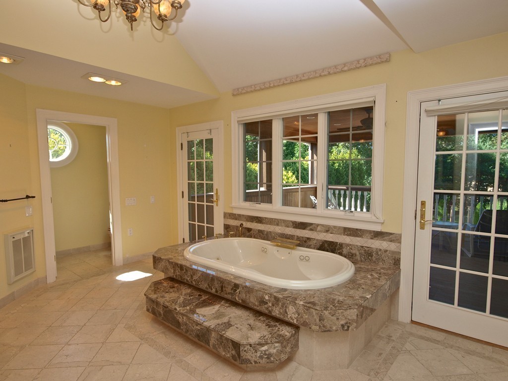 218 Bridle Trail Road Needham, MA 02492 - Photo 17 of 30 a bathroom with a tub and window