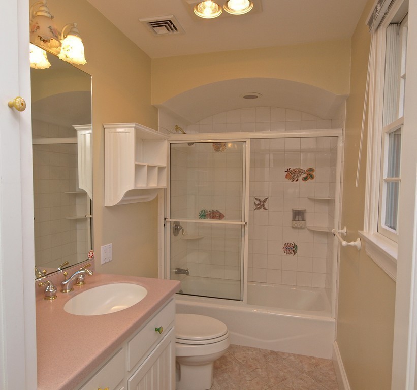 218 Bridle Trail Road Needham, MA 02492 - Photo 21 of 30 a bathroom with a granite countertop sink toilet and shower