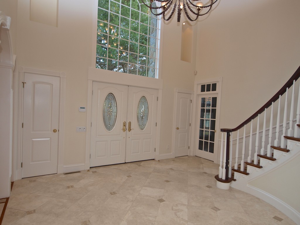 218 Bridle Trail Road Needham, MA 02492 - Photo 5 of 30 a view of an entryway with staircase