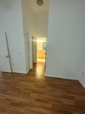 a view of entryway with wooden floor