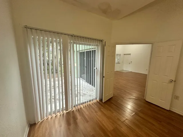 a kitchen with stainless steel appliances a stove a refrigerator and a sink