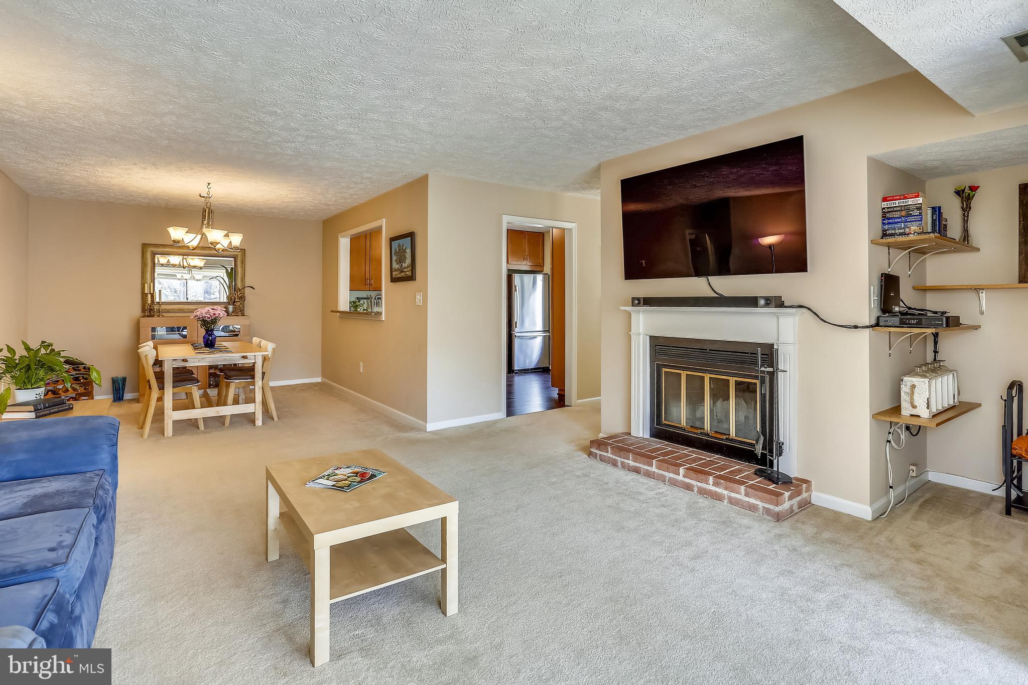2228 Hunter's Run Drive, Unit 2228 Reston, VA 20191 - Photo 11 of 35 Wood burning fireplace for those extra cozy times.