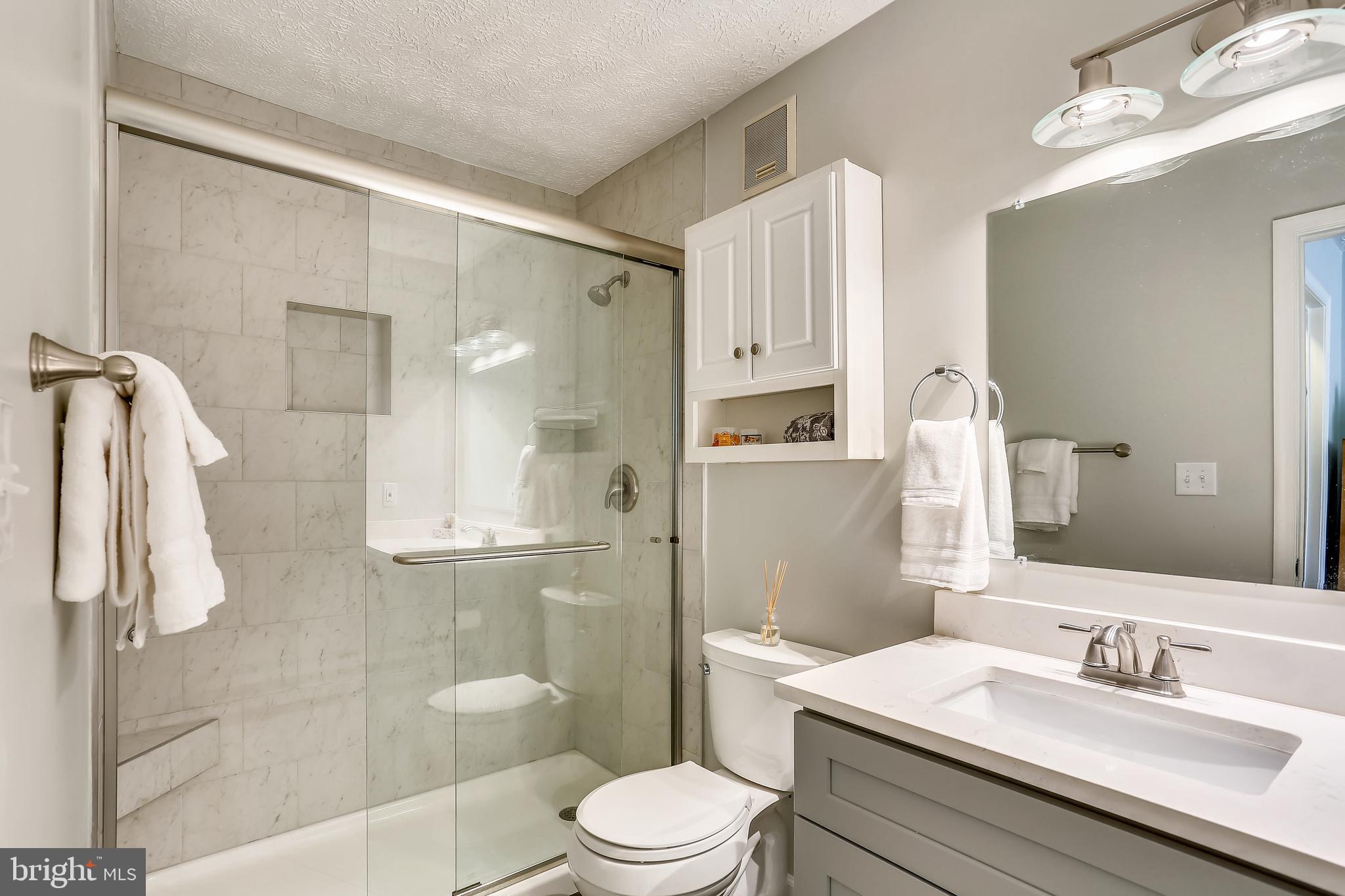 2228 Hunter's Run Drive, Unit 2228 Reston, VA 20191 - Photo 19 of 35 Beautifully Updated Primary Bath!!! Wow!