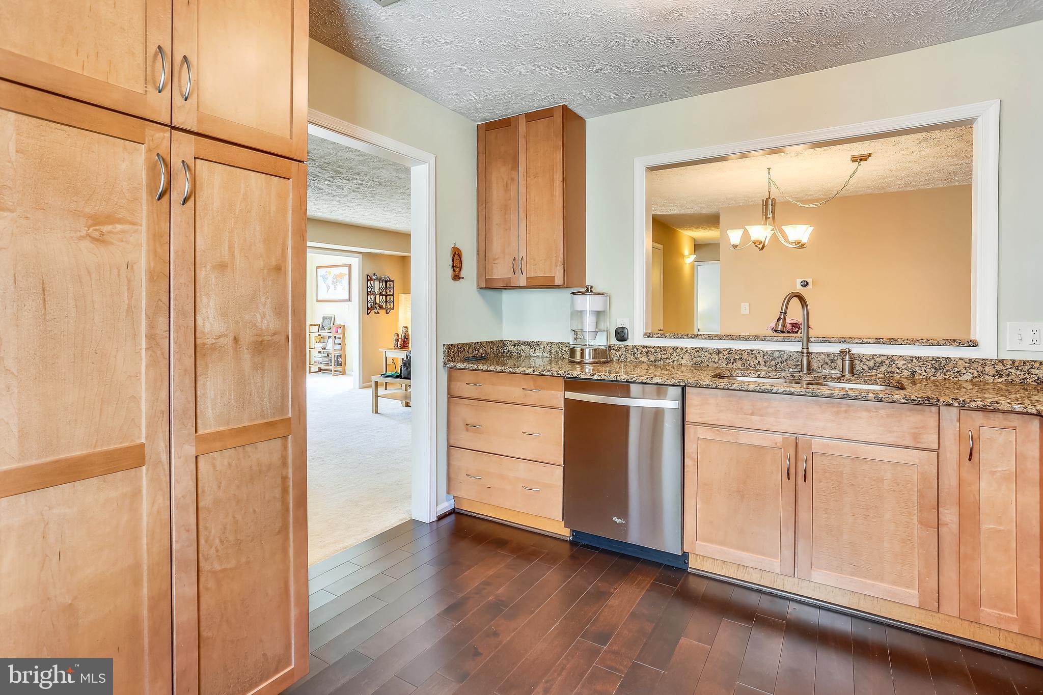 2228 Hunter's Run Drive, Unit 2228 Reston, VA 20191 - Photo 9 of 35 Open to the Dining Room and Living Room