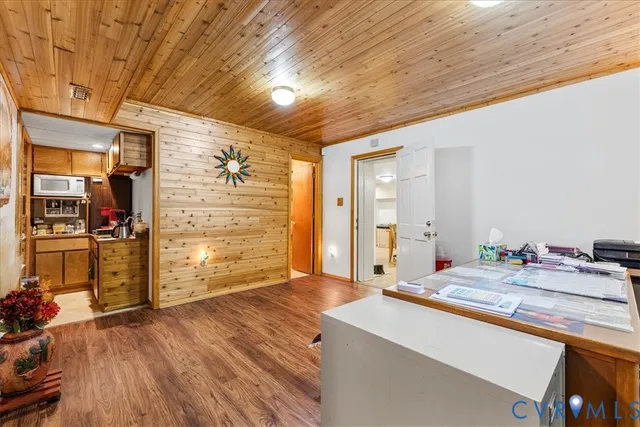 a kitchen with a sink stove and microwave