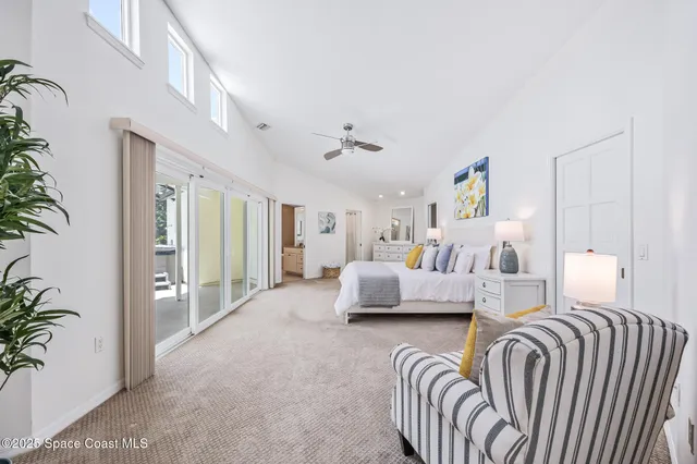 a bedroom with furniture and wooden floor