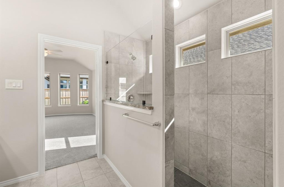 13814 San Pasqual Pointe Drive Cypress, TX 77433 - Photo 14 of 24 a bathroom with a shower