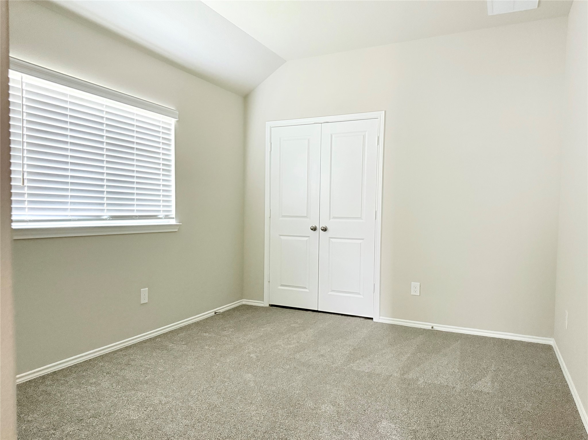 13814 San Pasqual Pointe Drive Cypress, TX 77433 - Photo 18 of 24 an empty room with a window