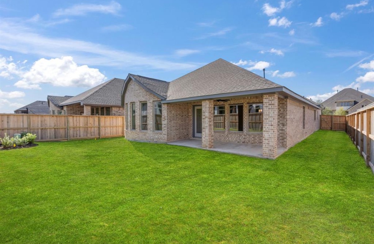 13814 San Pasqual Pointe Drive Cypress, TX 77433 - Photo 23 of 24 a view of a house with a big yard and large tree