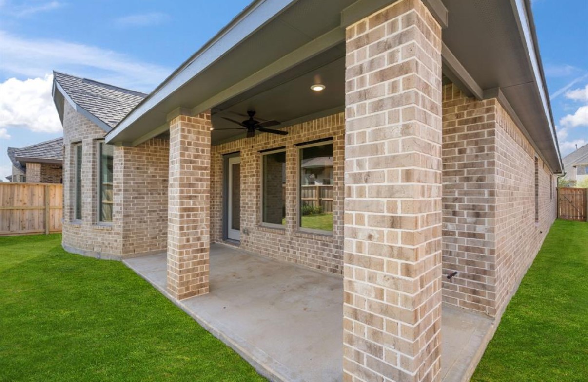 13814 San Pasqual Pointe Drive Cypress, TX 77433 - Photo 24 of 24 a view of a porch with a backyard