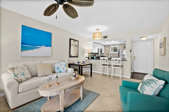 a kitchen with stainless steel appliances granite countertop a stove a refrigerator and a granite counter tops