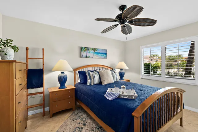 a bedroom with a bed and a view of bathroom