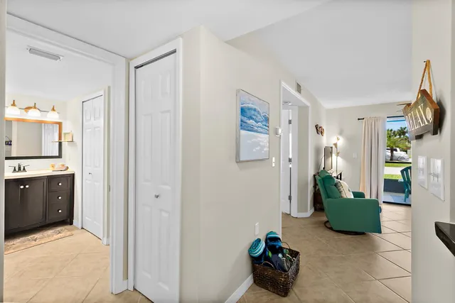 a view of a houses with a flower garden