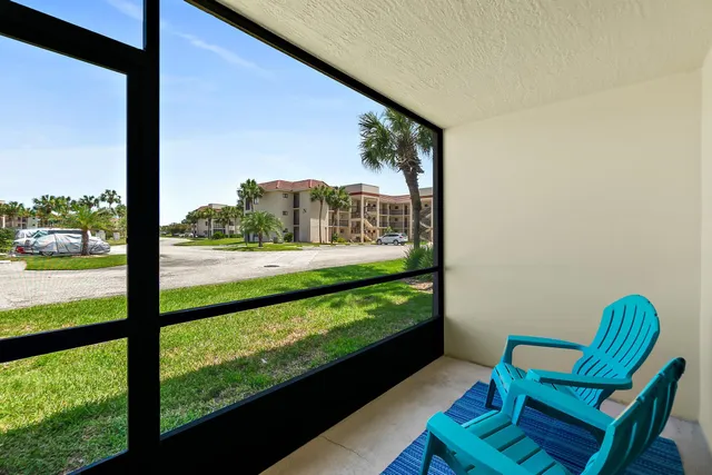a view of a lake with a bench in front of it