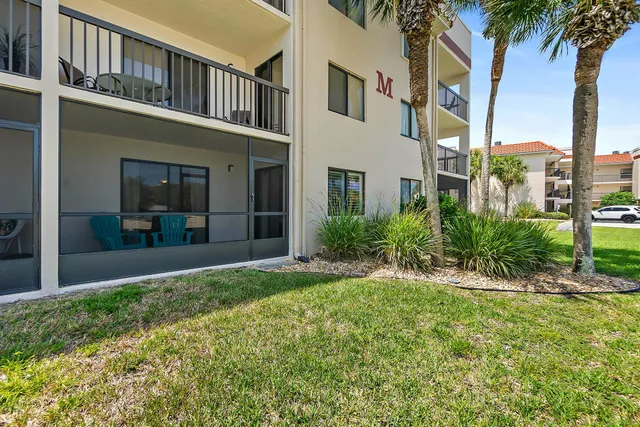 a view of a patio with swimming pool