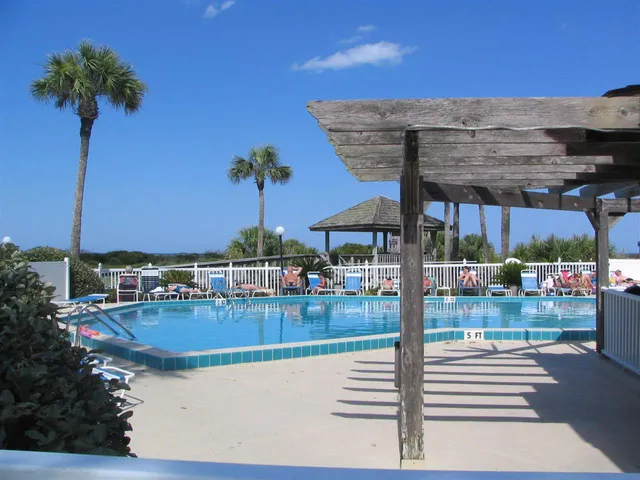 an aerial view of residential houses and outdoor space