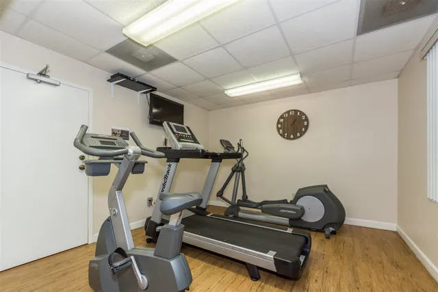 a swimming pool with outdoor seating