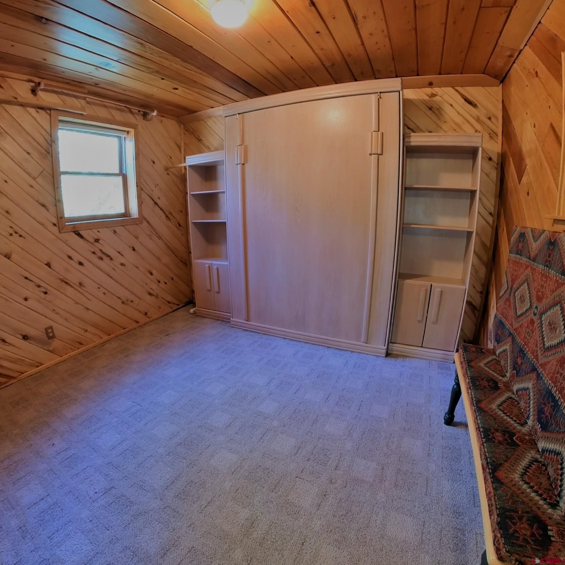 24119 Ute Trail Road Cedaredge, CO 81413 - Photo 17 of 26 a view of empty room with an empty room