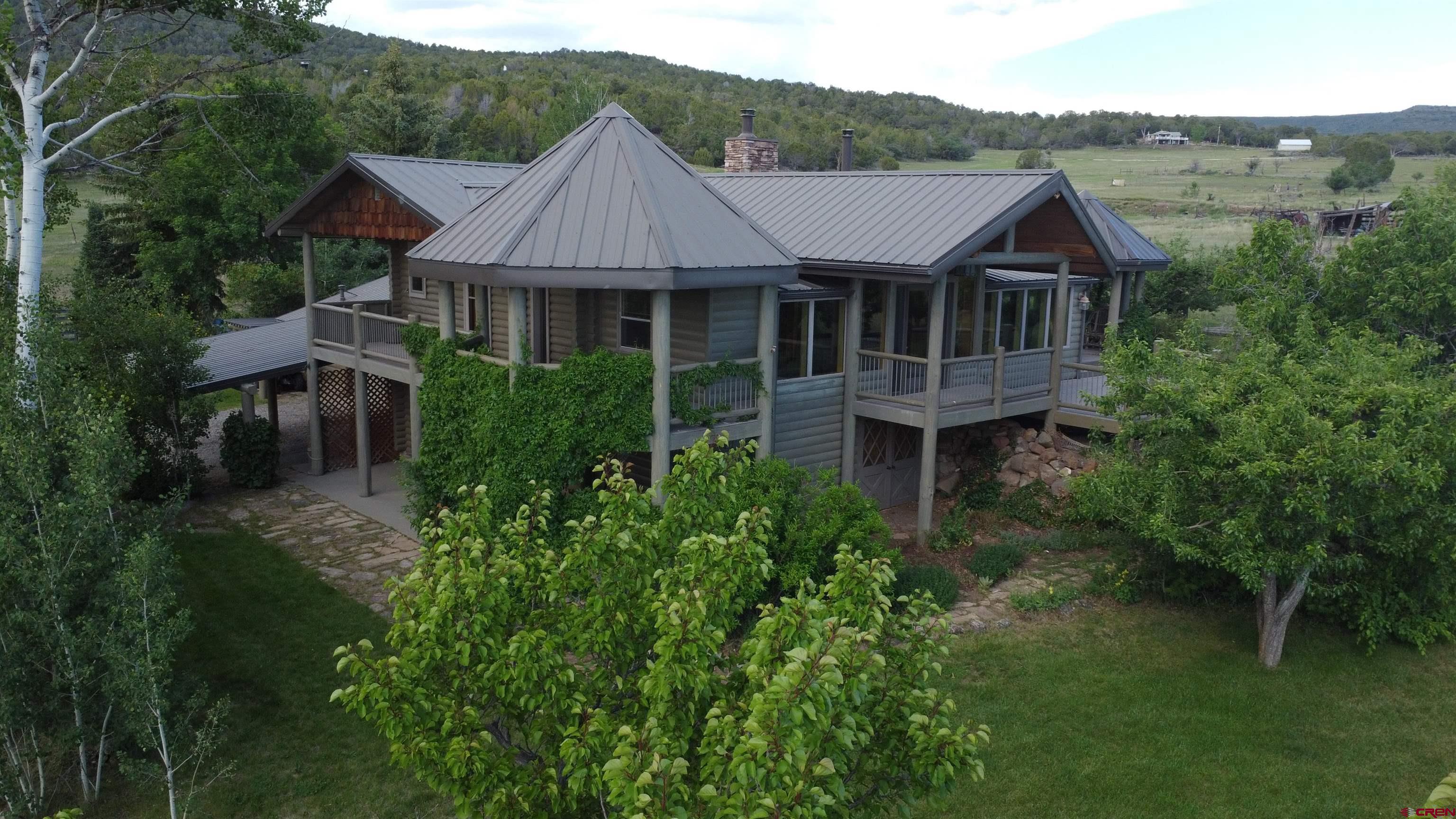 24119 Ute Trail Road Cedaredge, CO 81413 - Photo 20 of 26 an aerial view of a house