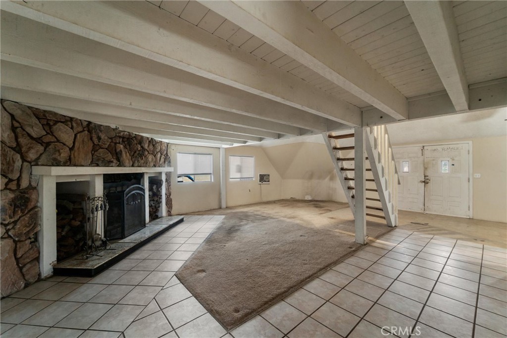 33041 Briggs Road Menifee, CA 92584 - Photo 17 of 60 a view of empty room with fireplace