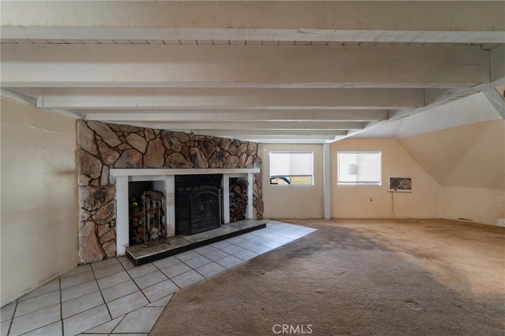 33041 Briggs Road Menifee, CA 92584 - Photo 21 of 60 a view of empty room and fire place
