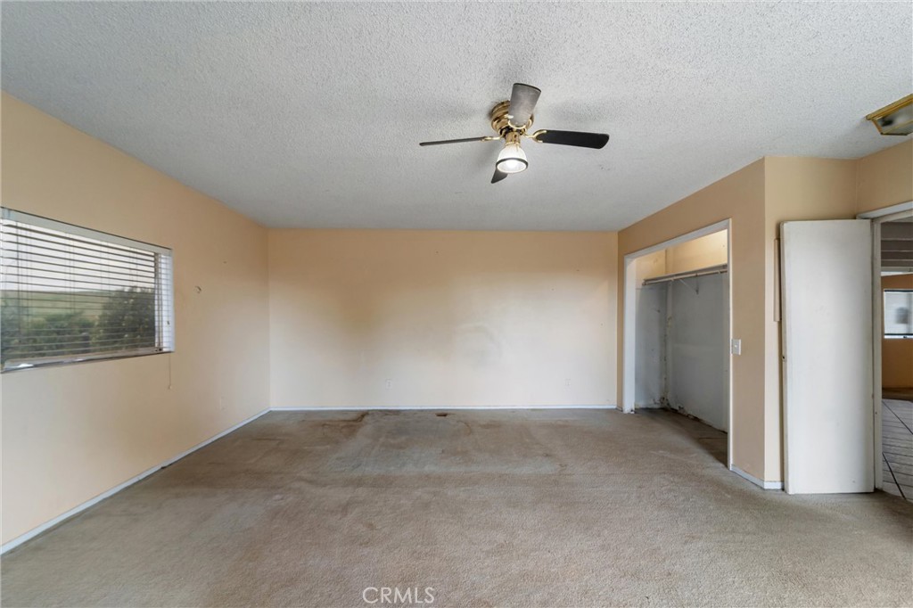 33041 Briggs Road Menifee, CA 92584 - Photo 27 of 60 a view of a room with a projector and fan