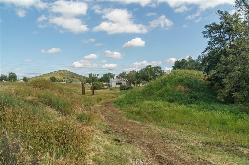 33041 Briggs Road Menifee, CA 92584 - Photo 52 of 60 a view of a big yard with lots of green space