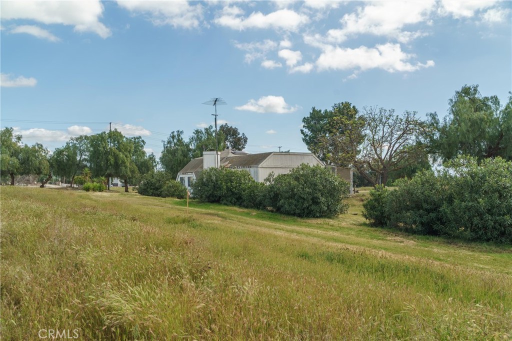 33041 Briggs Road Menifee, CA 92584 - Photo 57 of 60 a view of a grassy field with trees