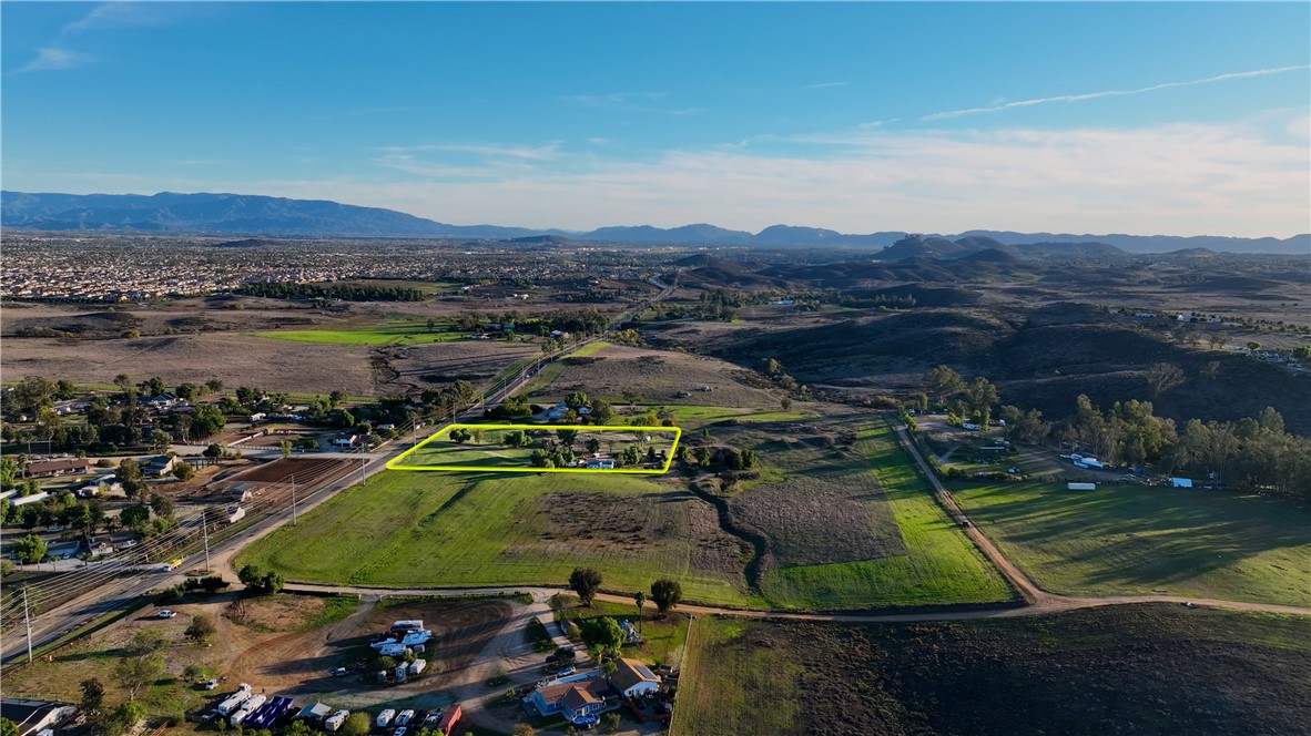 33041 Briggs Road Menifee, CA 92584 - Photo 7 of 60 an aerial view of residential houses with outdoor space and lake view