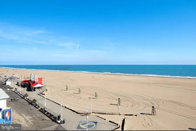 an aerial view of beach and ocean