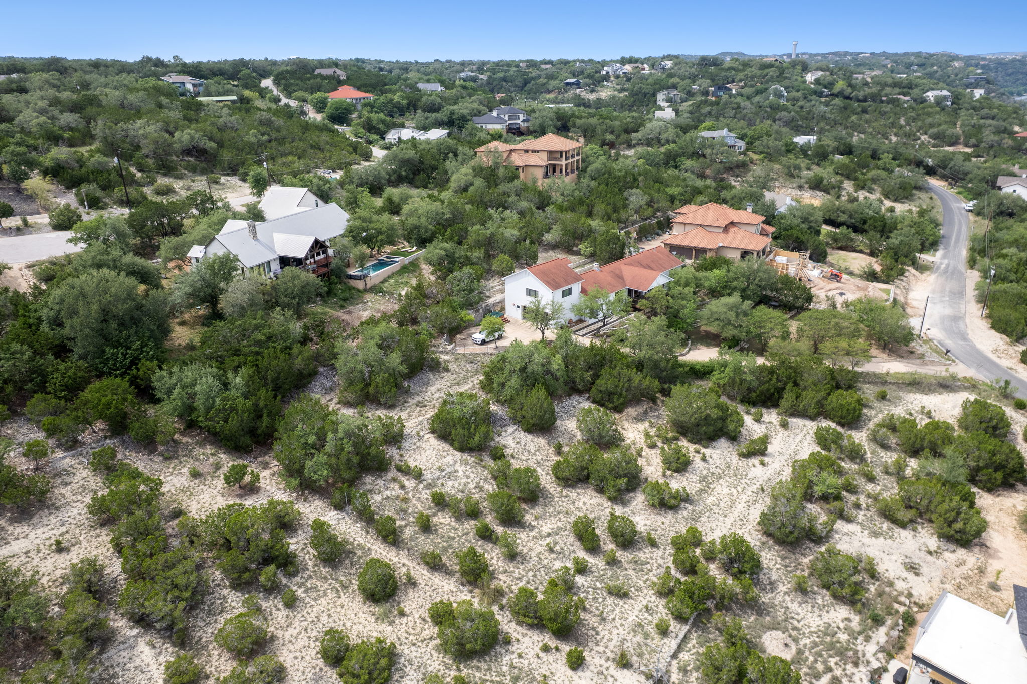 13607 Hunters Pass Austin, TX 78734 - Photo 2 of 13 Mid slope lot offers privacy as well as distant views