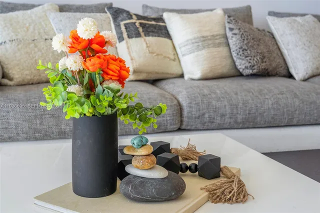a table with a sink and a mirror
