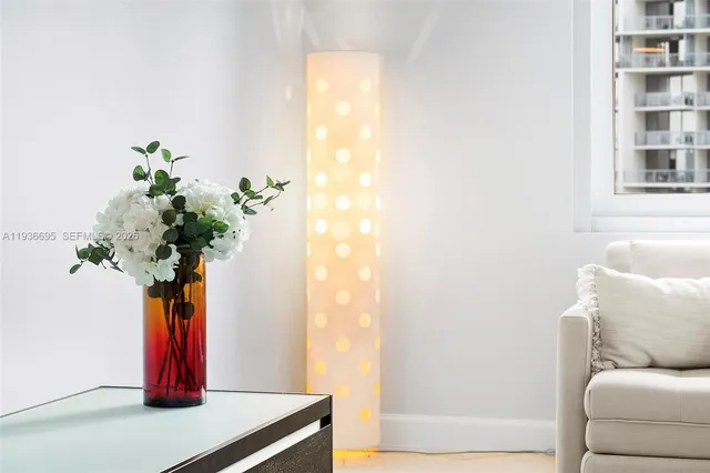 a bathroom with a light fixture and a sink