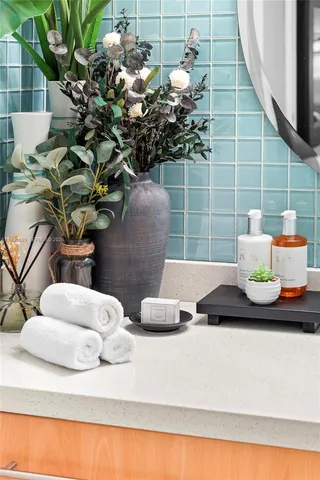 a bedroom with a bed window and wall painting