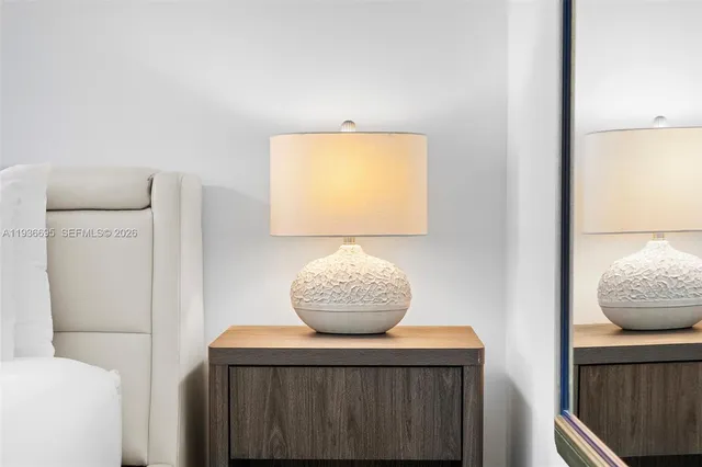 a living room with furniture couches and a flat screen tv