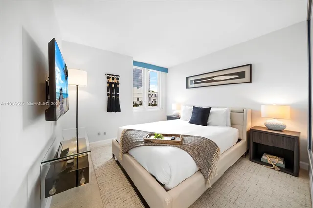 a kitchen with stainless steel appliances granite countertop a refrigerator stove and a sink