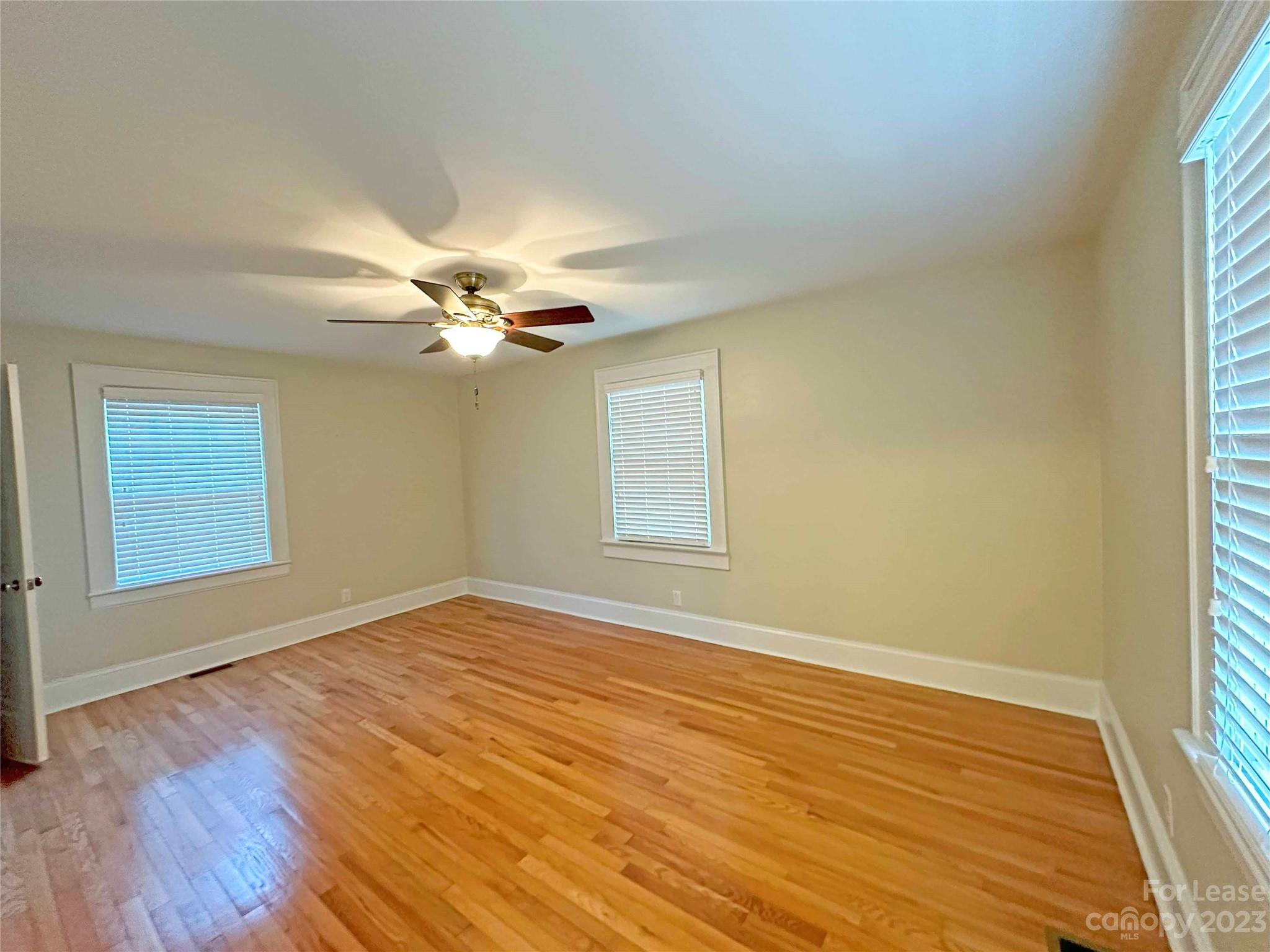 Undisclosed Address Hickory, NC 28601 - Photo 18 of 19 a view of a room with wooden floor and fan