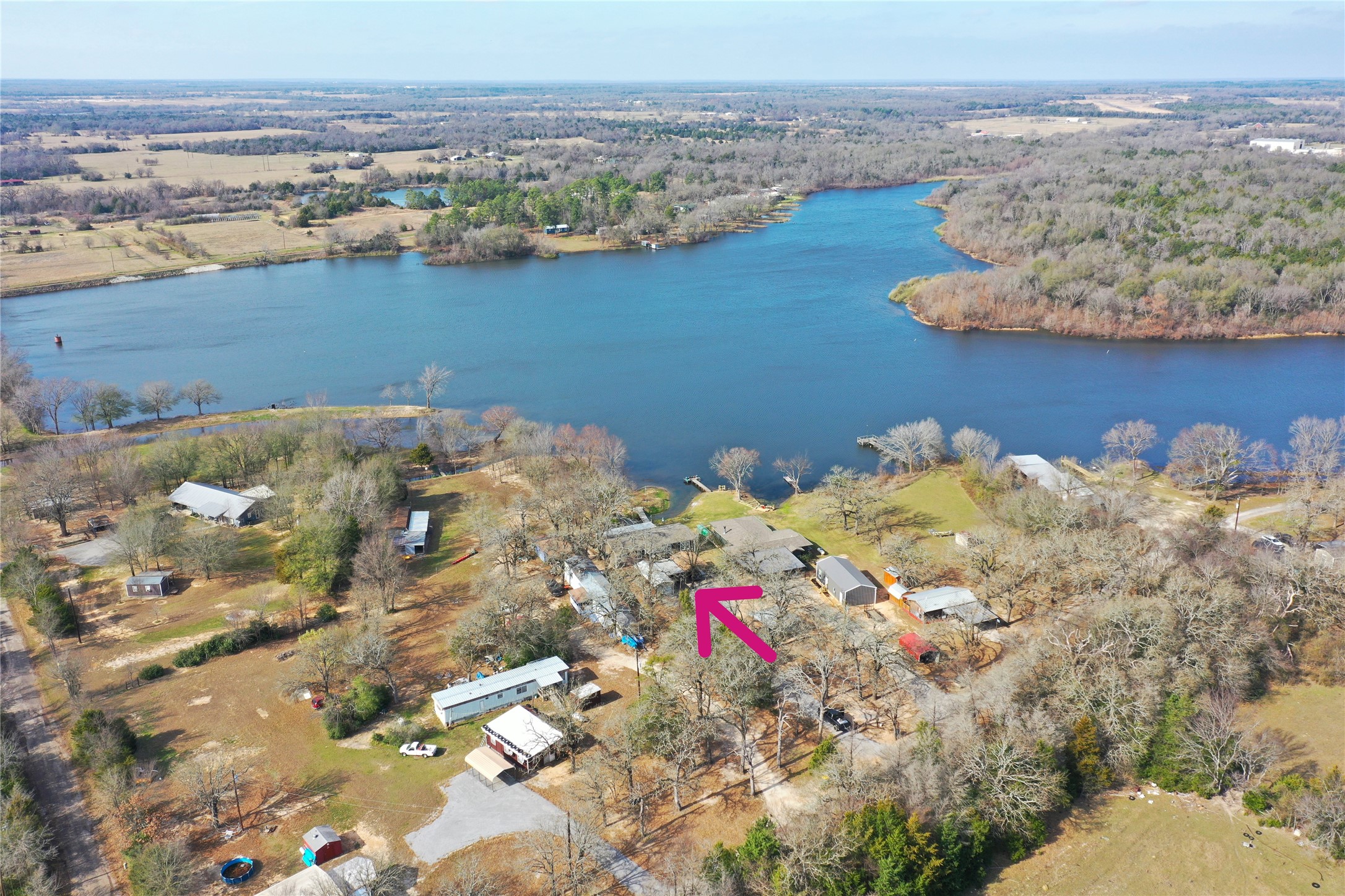 351 Clb Lk Road Teague, TX 75860 - Photo 1 of 33 a view of a lake with a mountain