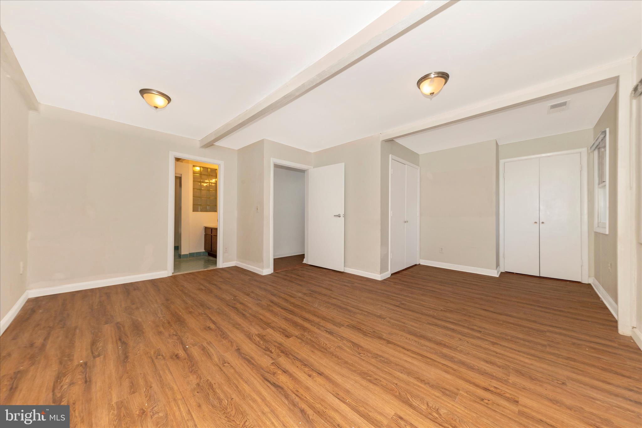 9309 Old Georgetown Road Bethesda, MD 20814 - Photo 20 of 50 a view of an empty room and wooden floor