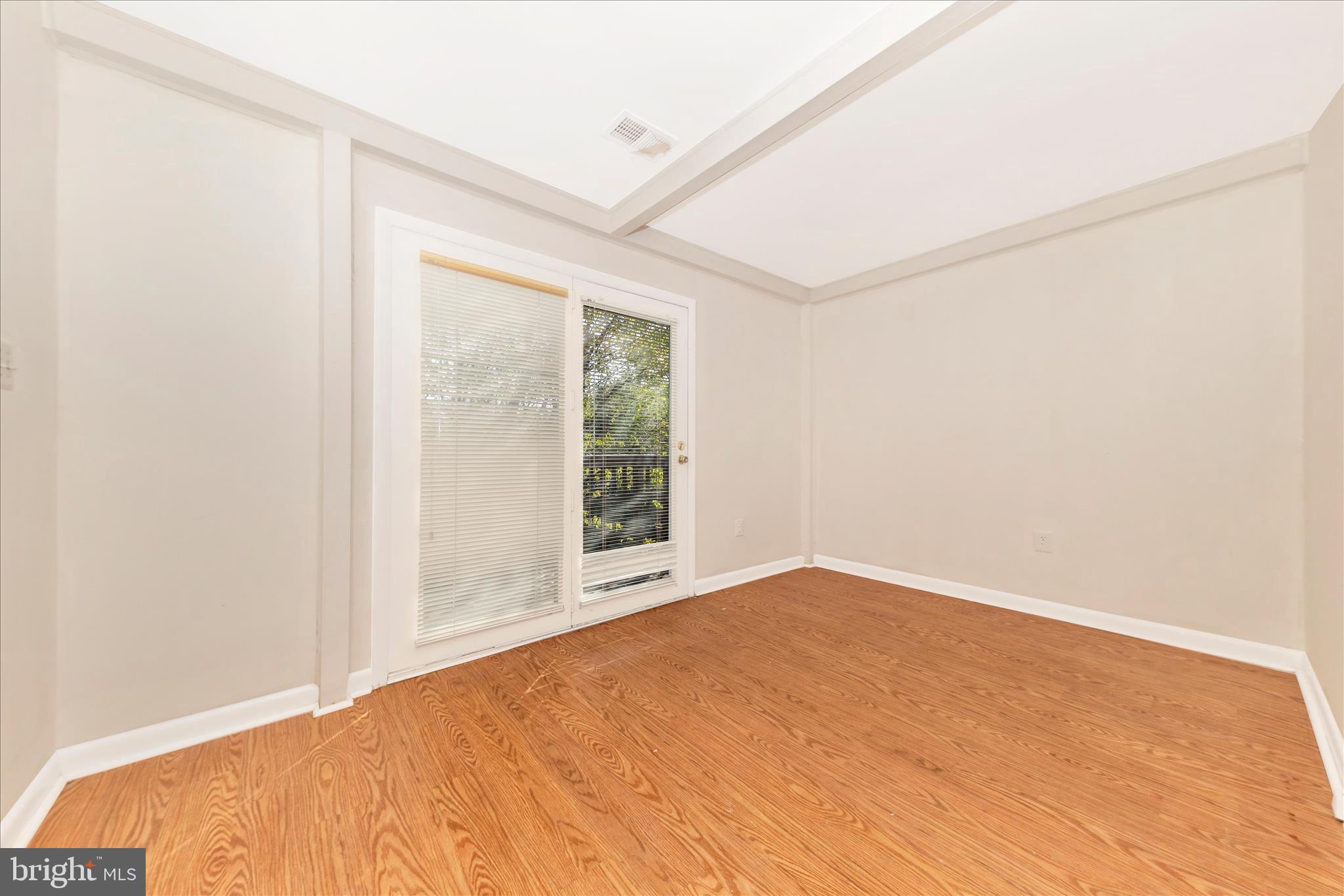 9309 Old Georgetown Road Bethesda, MD 20814 - Photo 24 of 50 a view of an empty room with a window