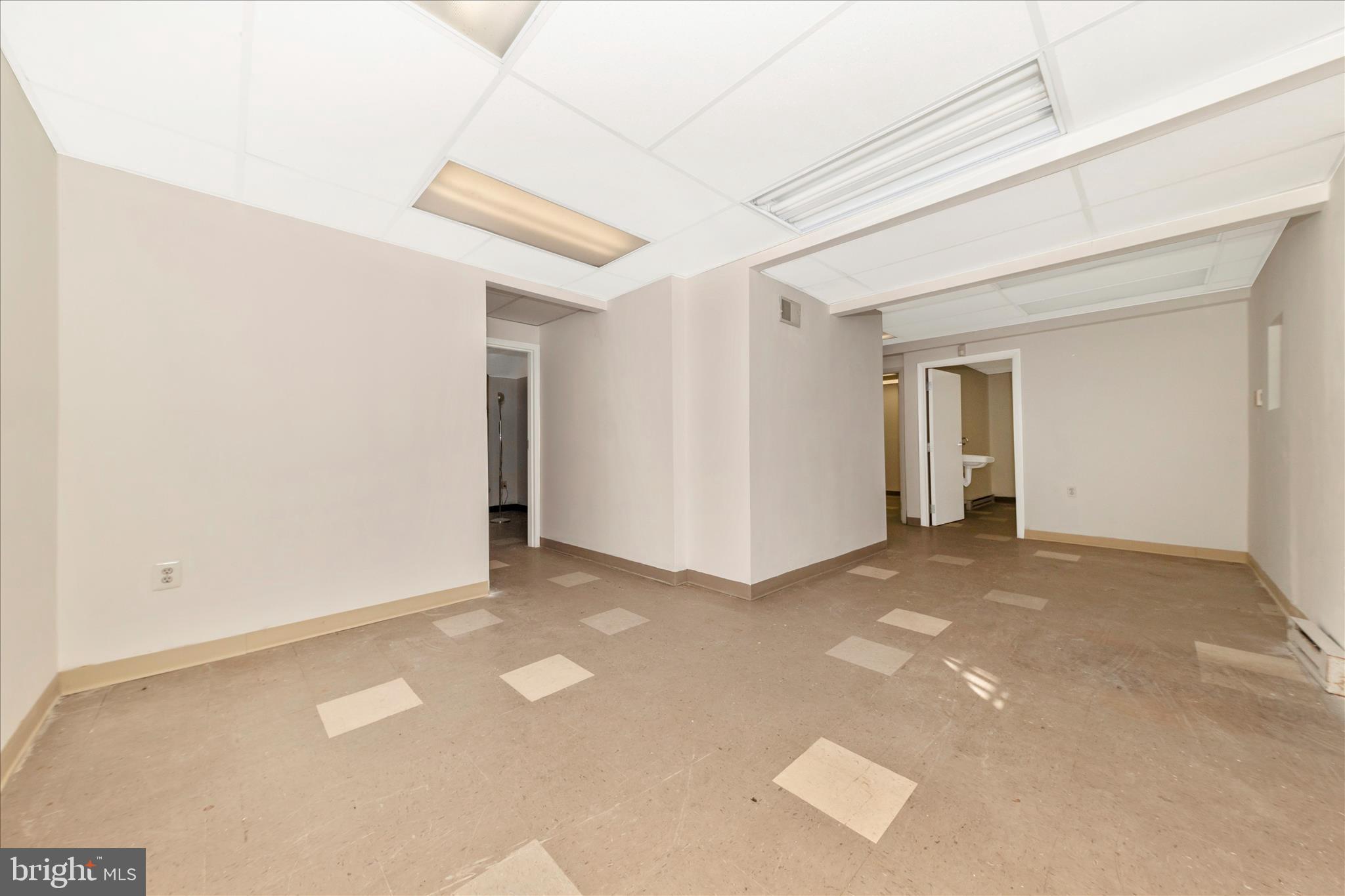 9309 Old Georgetown Road Bethesda, MD 20814 - Photo 31 of 50 a view of an empty room with a window