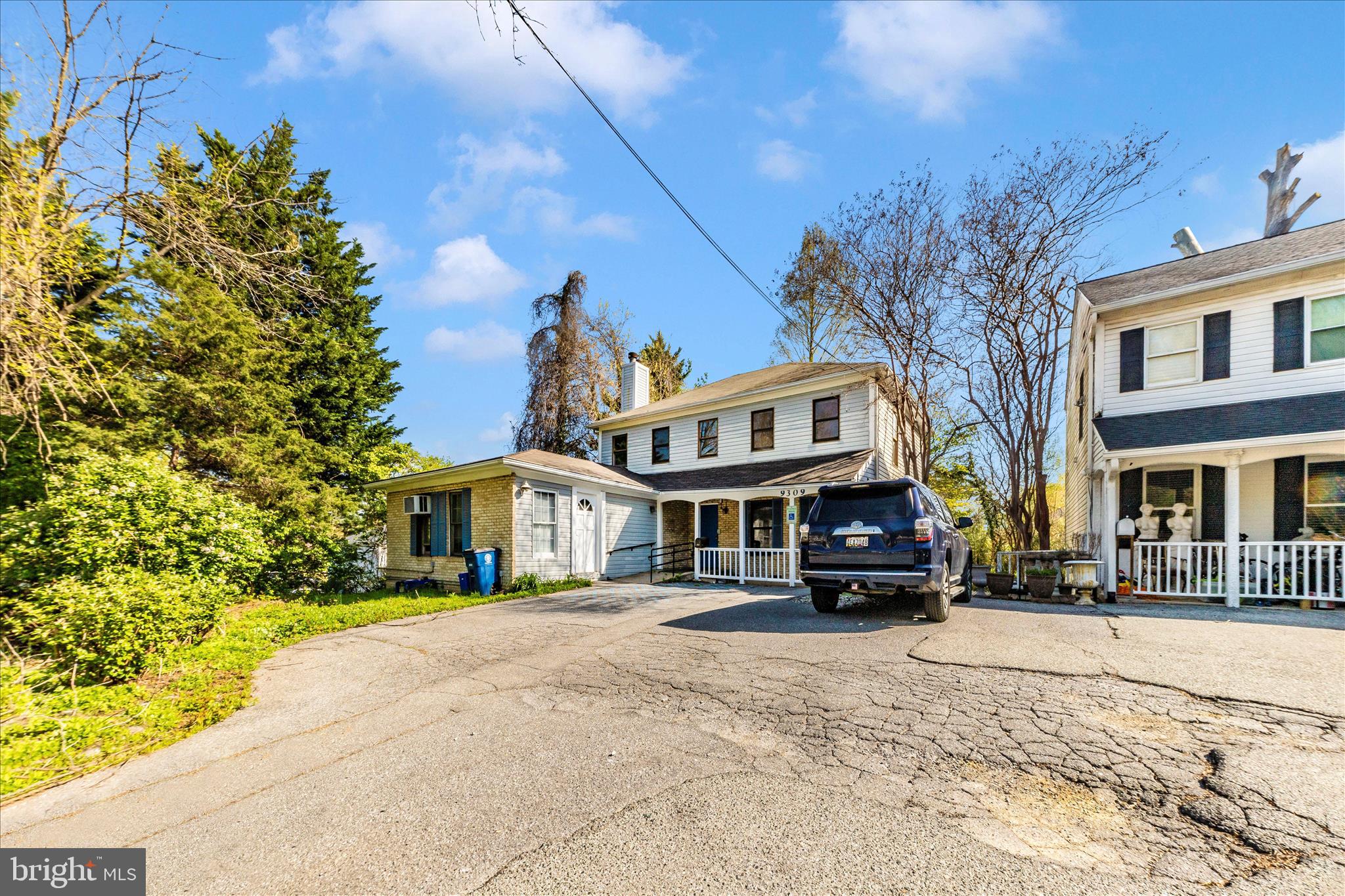 9309 Old Georgetown Road Bethesda, MD 20814 - Photo 37 of 50 a front view of a building with street view