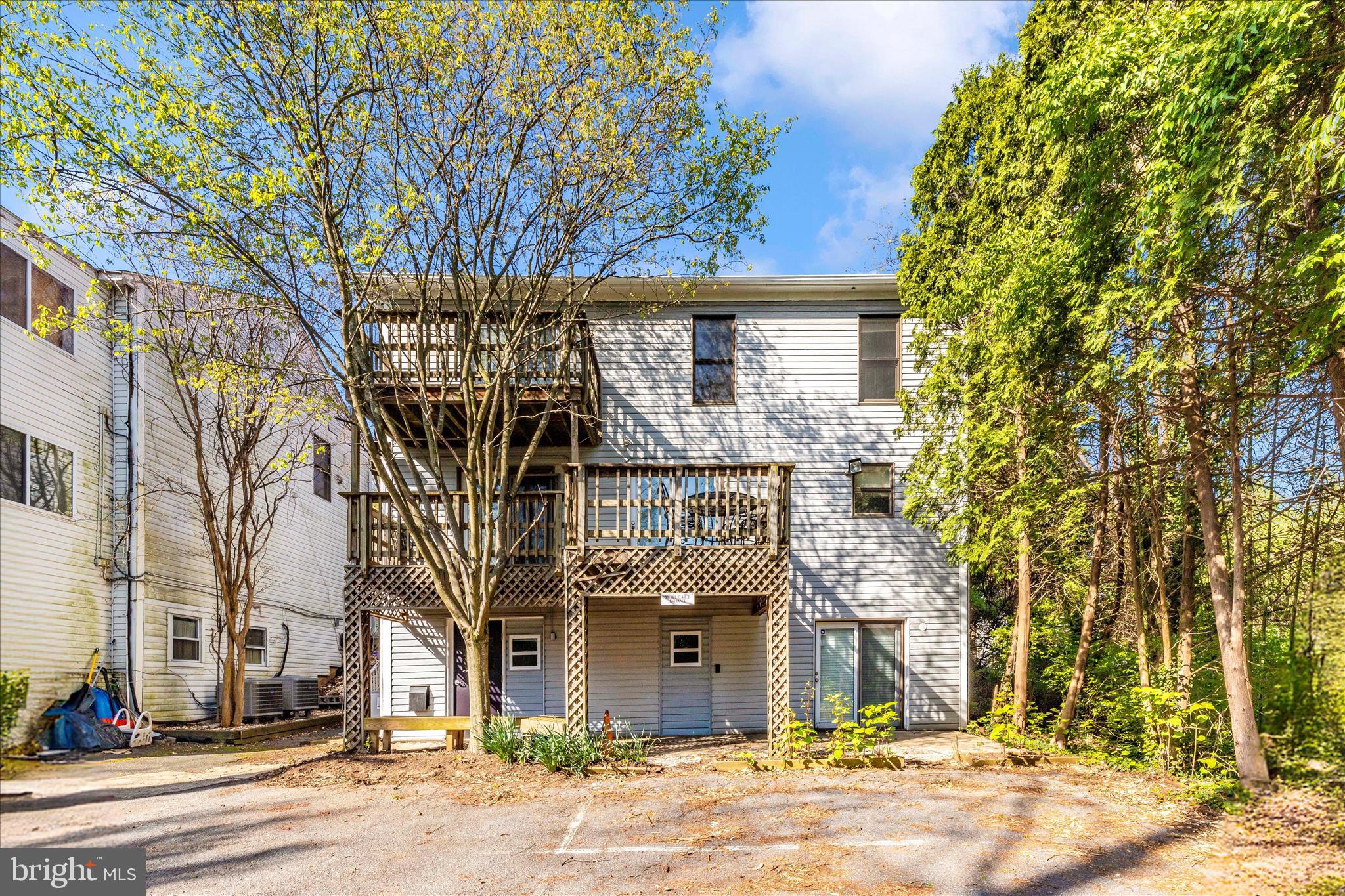 9309 Old Georgetown Road Bethesda, MD 20814 - Photo 42 of 50 front view of a building with a street